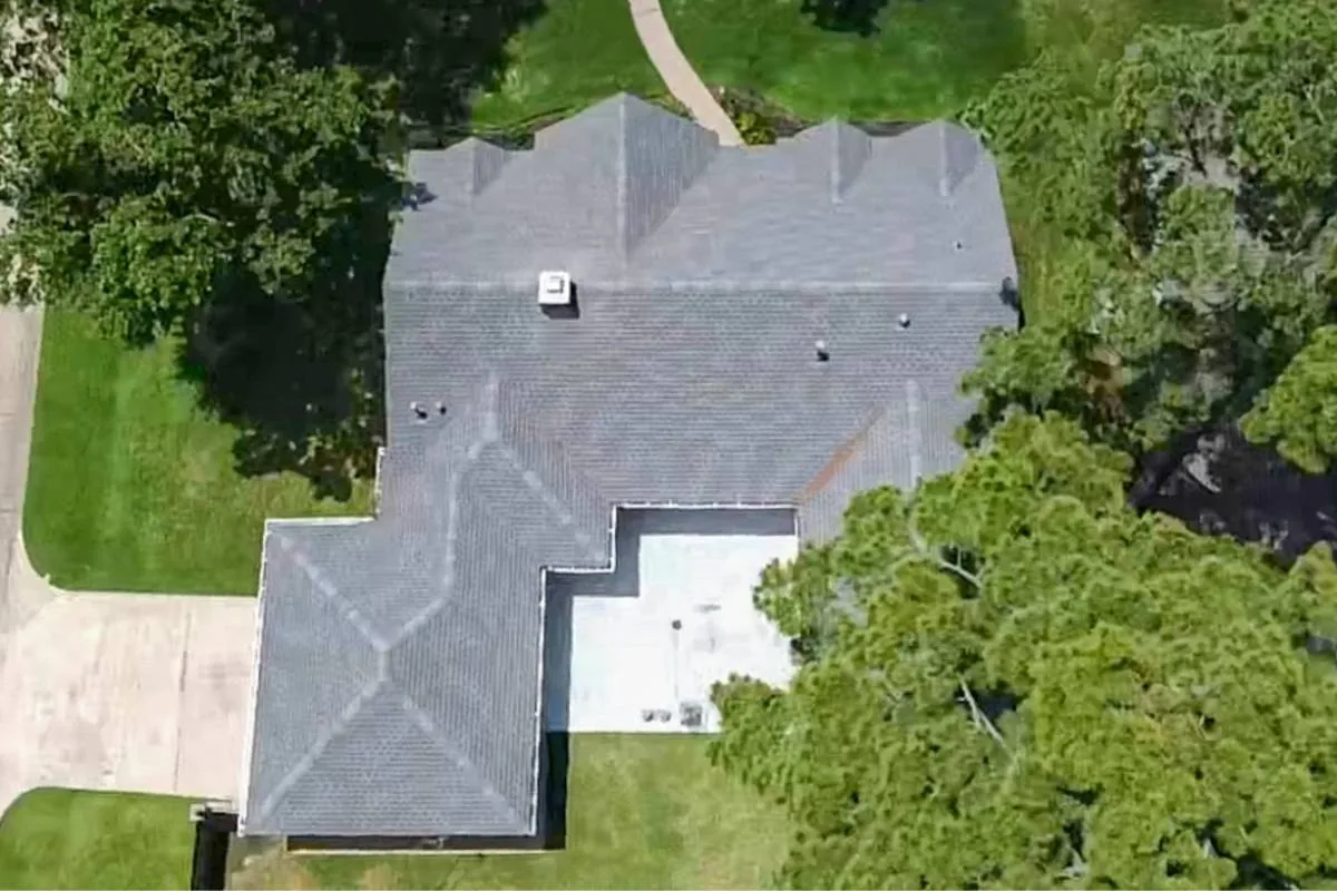 Aerial view of a large gray shingle roof