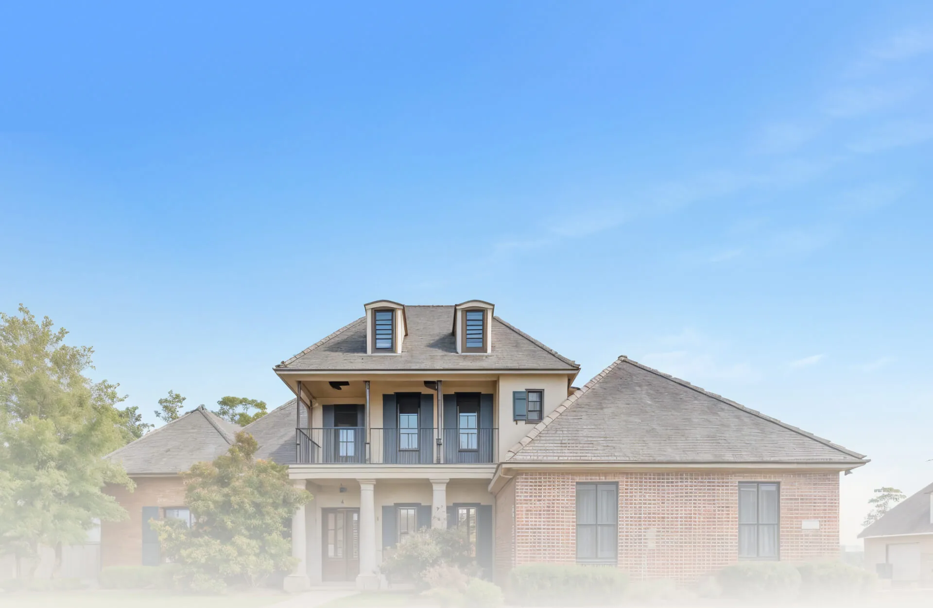 Two-story house with a balcony in Prien Lake Village
