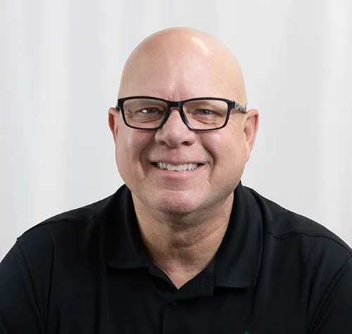 Portrait of Chris Manson, M&M Roofing area manager