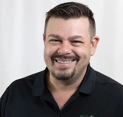 Portrait of Travis Diekmann, M&M Roofing area manager